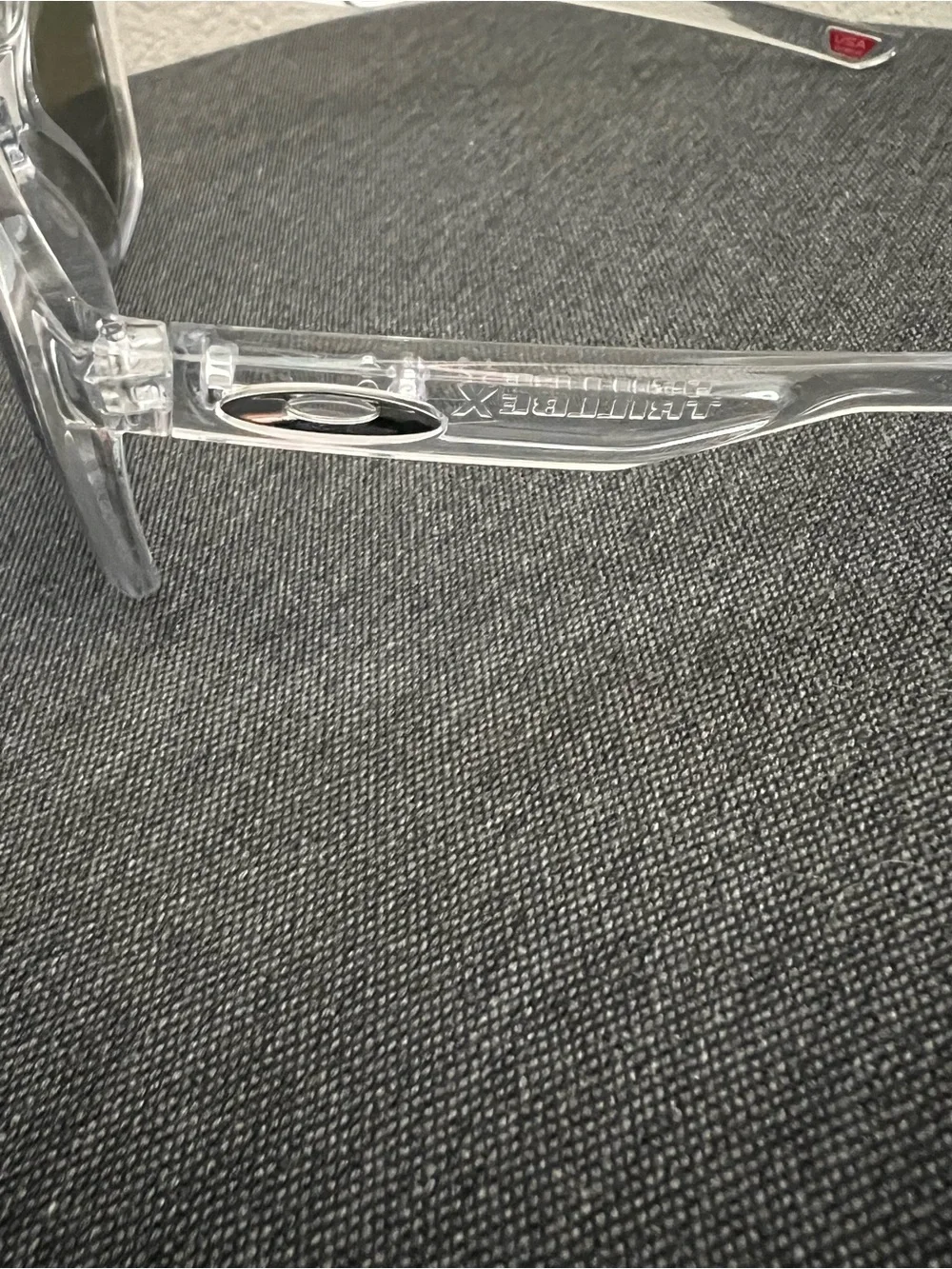 Oakley Clear Frame Sunglasses with Bright Blue Mirrored Lenses